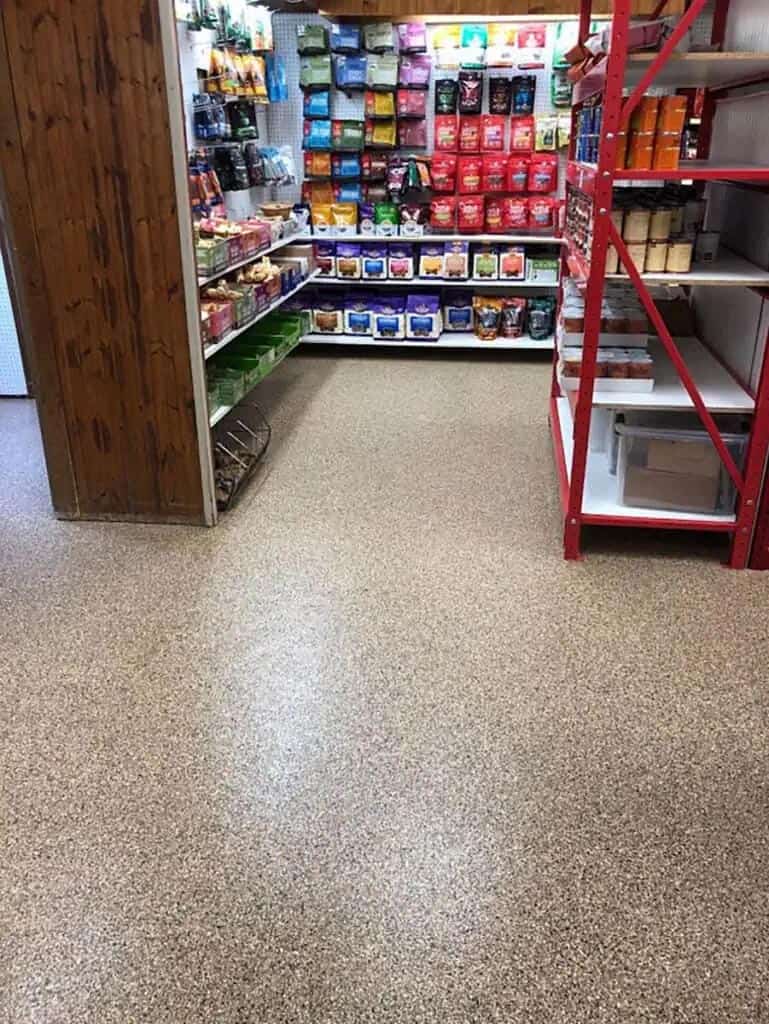 Food storage room with mica-infused full flake epoxy flooring.